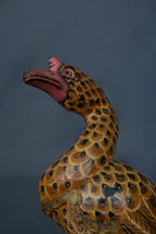 Handgesneden en beschilderd houten eend in Balinese stijl